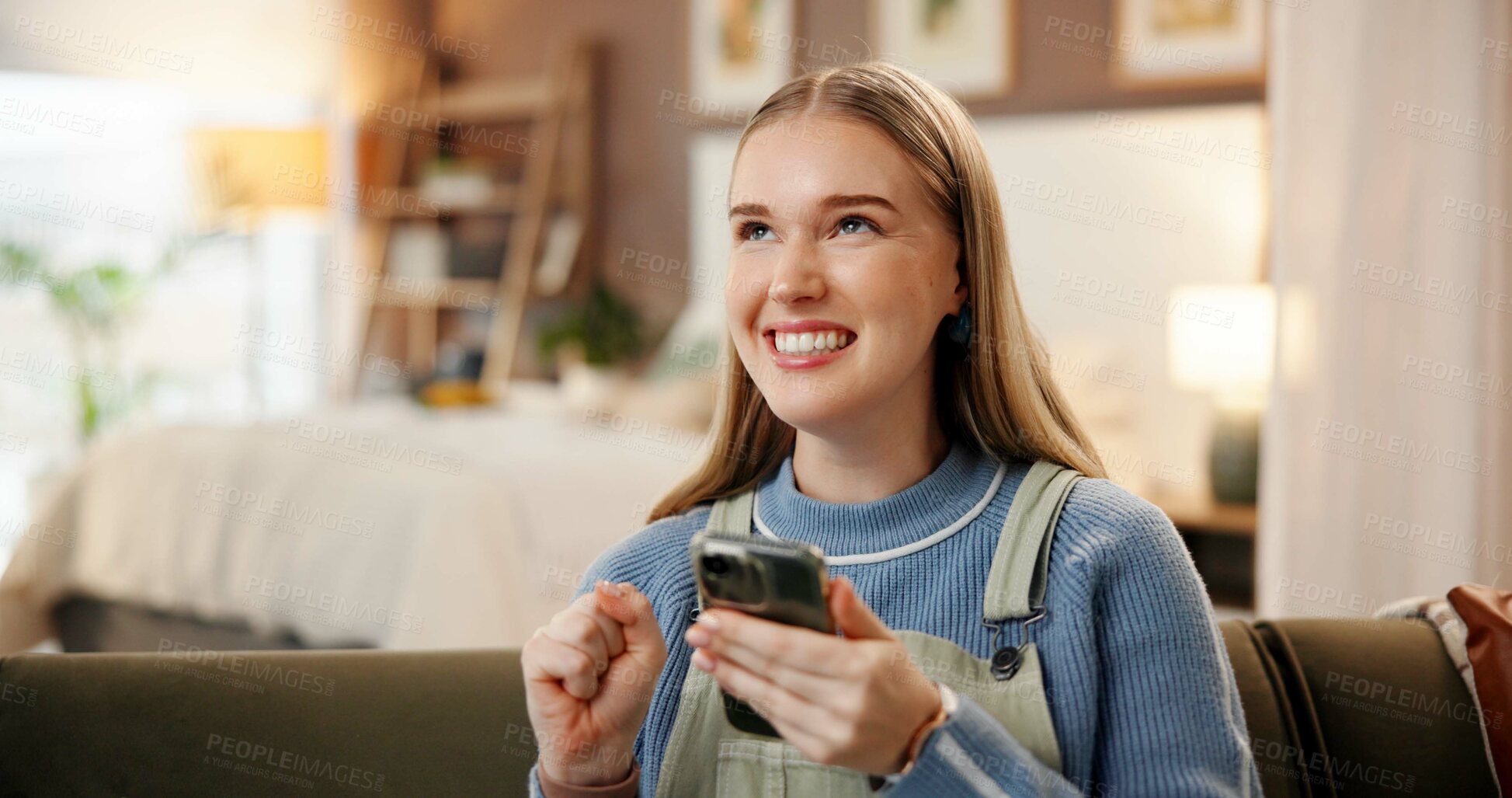 Buy stock photo Phone, fist pump and woman on sofa in home with winning, bonus or prize for online gambling. Happy, technology and female person on cellphone with celebration for lottery announcement in house.