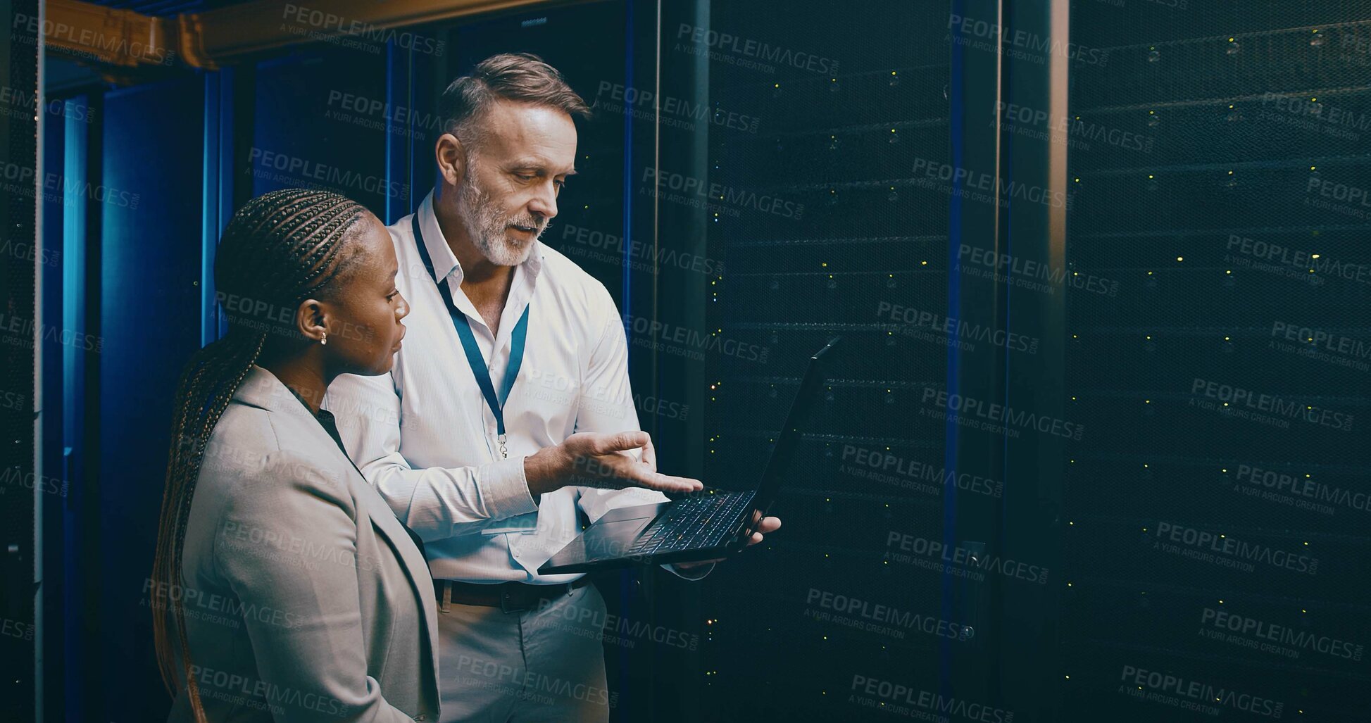 Buy stock photo Administration, laptop and upgrade with people in server room together for network maintenance. Collaboration, computer and cybersecurity with tech support team in data center to install firewall