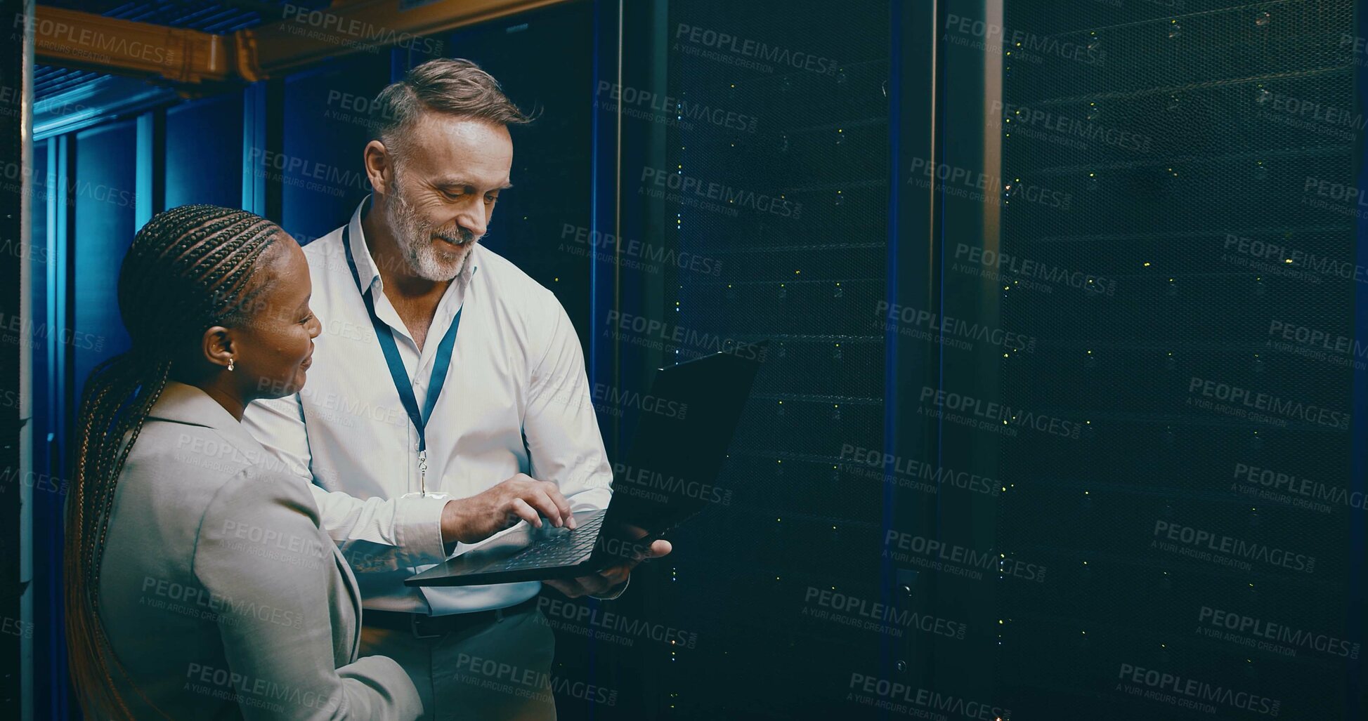 Buy stock photo Collaboration, laptop and upgrade with people in server room together for network administration. Computer, cybersecurity and storage with tech support team in data center for firewall installation