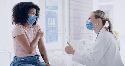Buy stock photo Healthcare, face mask and doctor with woman for thumbs up in hospital for consultation with vaccination. Happy, checkup and medical worker with patient for injection, medicine or medication in clinic
