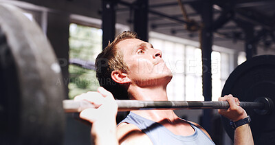 Buy stock photo Man, fitness and weightlifting with barbell for muscle gain, workout or intense arm exercise in gym. Active, male person or lifting with weight for physical strength, training or power in health club