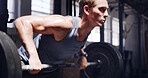 Man, fitness or weightlifting with barbell in gym for muscle gain, strength or intense workout. Active, male person or lifting weight for physical challenge, power training or exercise in health club