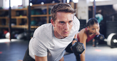 Buy stock photo Man, coach and fitness with dumbbells in gym class for muscle gain, workout or exercise. Active, personal trainer or training with woman for balance, strength or weightlifting together in health club