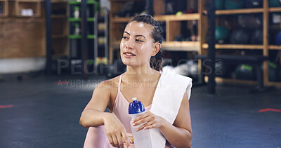 Buy stock photo Water, sweat and thinking with woman in gym for electrolytes recovery, workout fatigue and resting. Relax, intense exercise and drink with person in sports club for training, reflection and break