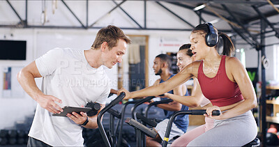 Buy stock photo Man, tablet and people on bicycle in spin class for fitness results, schedule session and progress. Coach, digital app and tracking for cycling exercise, training performance and workout management