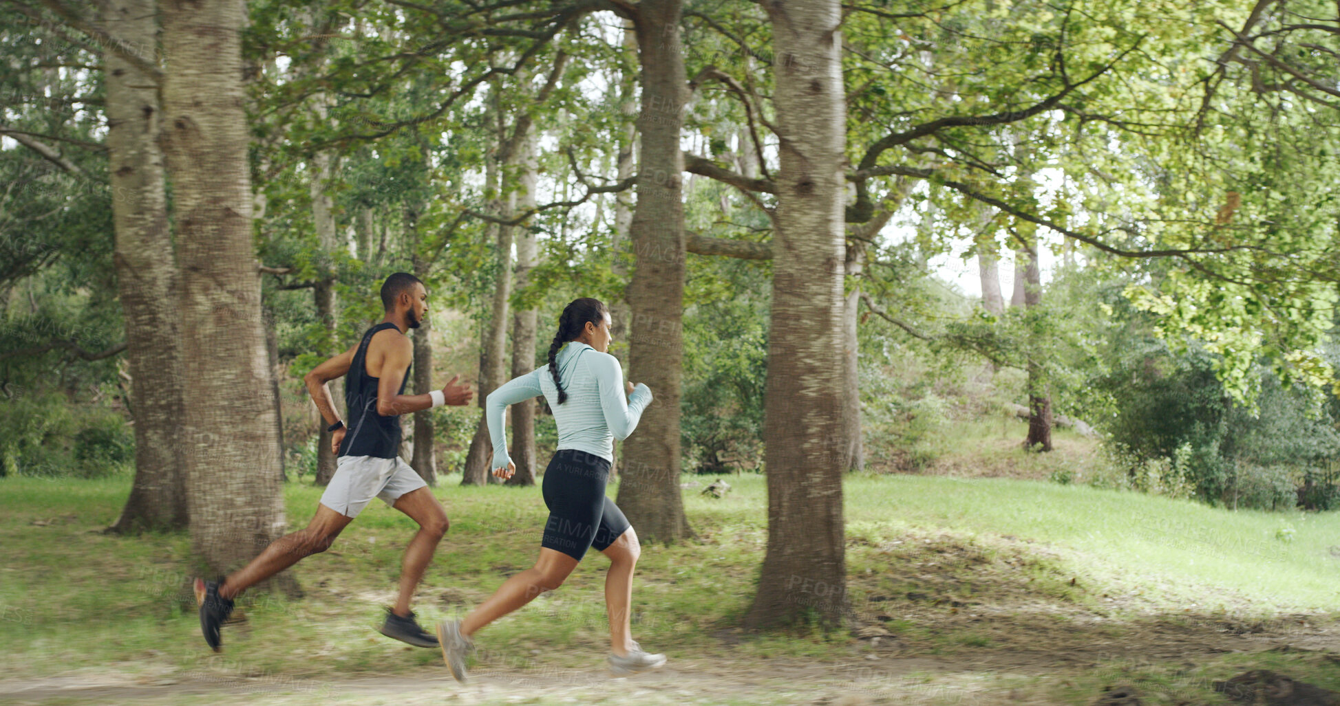 Buy stock photo Athlete, couple and running in nature for fitness, team exercise and cardio training. People, runner and sports workout with endurance challenge, marathon practice and wellness competition in forest