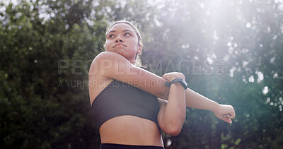 Buy stock photo Woman, warm up and stretching arms in park for fitness, preparation and thinking for wellness. Nature, outdoor and training for exercise with runner, getting ready and flexibility with low angle