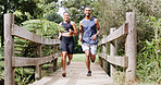 Smile, couple and running in forest for fitness, team exercise and cardio training. People, runner and sports workout with endurance challenge, marathon practice and wellness competition in nature