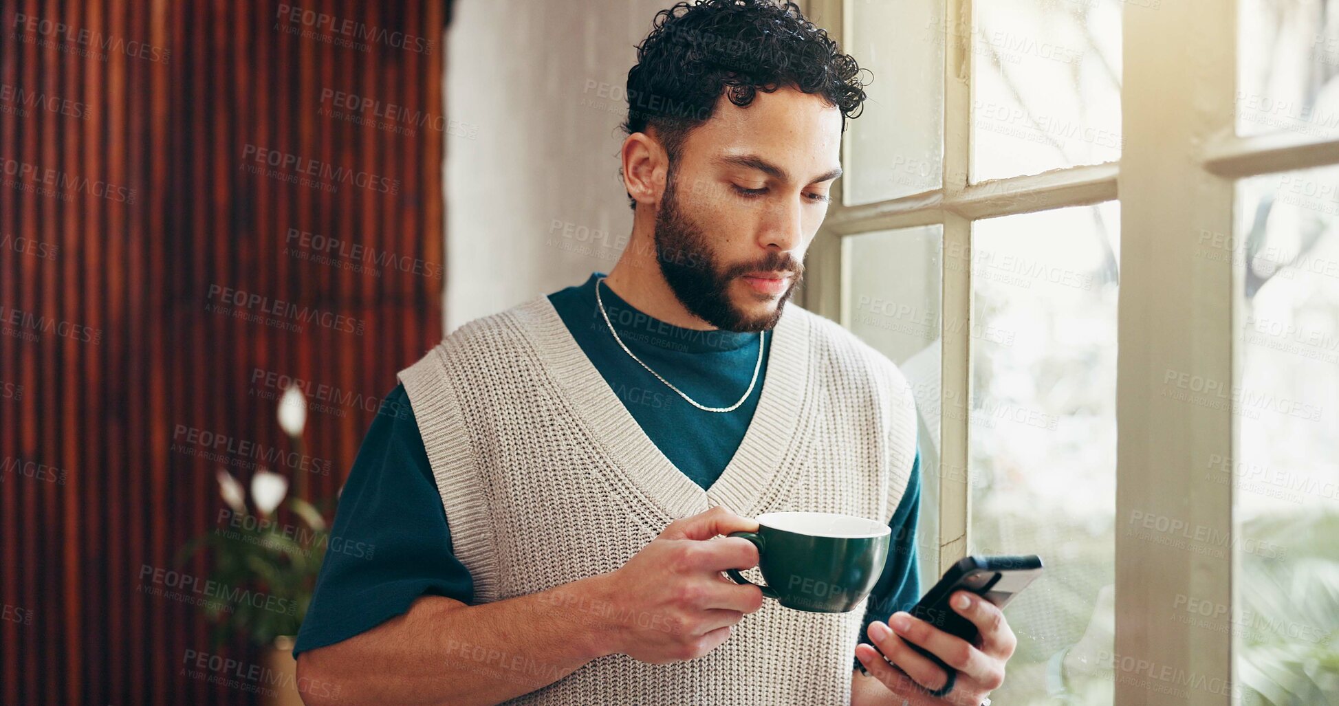 Buy stock photo Coffee, phone and business man in office to check news report, email or online review by window. Tea, mobile and creative journalist on internet for reading text, communication or update headline