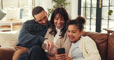 Buy stock photo Parents, girl and relax with phone on couch, laugh and streaming funny video, game or bonding in lounge. Dad, mother and daughter with love, smartphone and app with comic post on web at family house