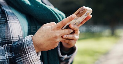 Buy stock photo Park, student and hands with smartphone, typing and communication for upcoming test on social media. Outdoor, space and person with mobile for chat, texting and updates of exam schedule and online