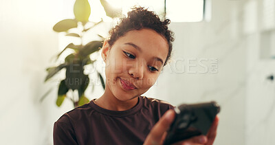 Buy stock photo Browsing, smartphone and child with smile, bathroom and playing video games on website and thinking. Gamer, online and entertainment on mobile app, reflection and girl with tech for fun in house
