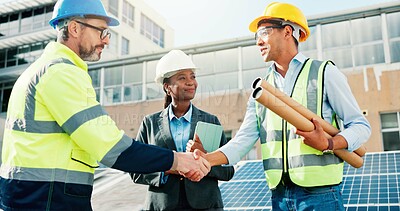 Buy stock photo Solar panel, technician or handshake with blueprint outdoor for PV installation, project deal or team. Engineer, people and shaking hands on rooftop for renewable energy and sustainable maintenance