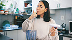 Woman, blender and taste smoothie in kitchen, portrait and self care with drink, detox or diet at house. Person, milkshake and lick finger in home with appliance, weight loss or nutrition in Cambodia