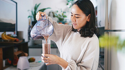 Buy stock photo Pouring, smoothie and woman with blender, kitchen and liquid with gut health benefits, diet and home. Beverage, nutrition and person with equipment for protein shake, detox and wellness with drink