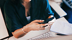 Above, hands of woman in home office with phone, online communication or research scroll in remote work. Digital, WFH and freelancer in house with tech, planning or schedule update in task management