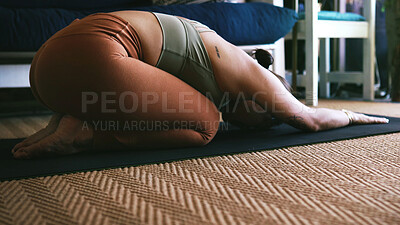 Buy stock photo Floor, yoga and stretching with woman in home for balance, posture workout and health. Wellness, pilates exercise and childs pose with person in living room for zen, self care and holistic habit