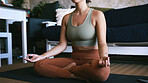 Woman, hands and meditation with yoga mat in home for spiritual wellness or healing on floor. Female person, yogi or zen with lotus pose, chakra or mudra for inner peace, balance or mindfulness