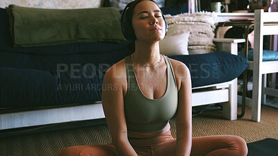 Buy stock photo Home, meditation and woman with headphones, yoga or routine for mindfulness, calm and self awareness. Streaming, music and inner peace on floor, zen and person with tech and wellness in apartment