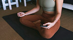 Woman, hands or meditation with phone for online class, inner peace or spiritual healing in home. Female person, yogi and zen app with mobile smartphone for awareness, health and wellness in house