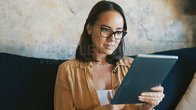 Buy stock photo Reading, tablet and typing with woman on sofa for social media, email communication and app. Connection, online chat forum and research with person in living room of home for post update and blog