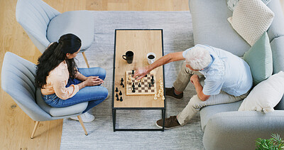 Buy stock photo Chess, woman and grandpa play in home for bonding, board game or strategic thinking for mental challenge. Problem solving, above and people with match practice, family activity and planning checkmate