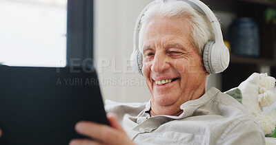 Buy stock photo Music, smile and tablet with old man on sofa in living room of home for streaming subscription. App, headphones and retirement with happy senior person in apartment for audio or sound entertainment