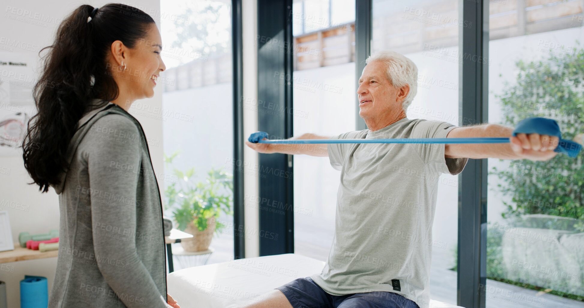 Buy stock photo Resistance band, stretching or old man with physiotherapist, consultation or wellness. Mature patient, people or equipment with muscle recovery, rehabilitation or medical service with help or support