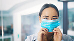 Portrait, doctor or woman in hospital with face mask for healthcare consultation or protection from Covid. Space, medical professional or PPE for safety compliance, wellness or spread of coronavirus.