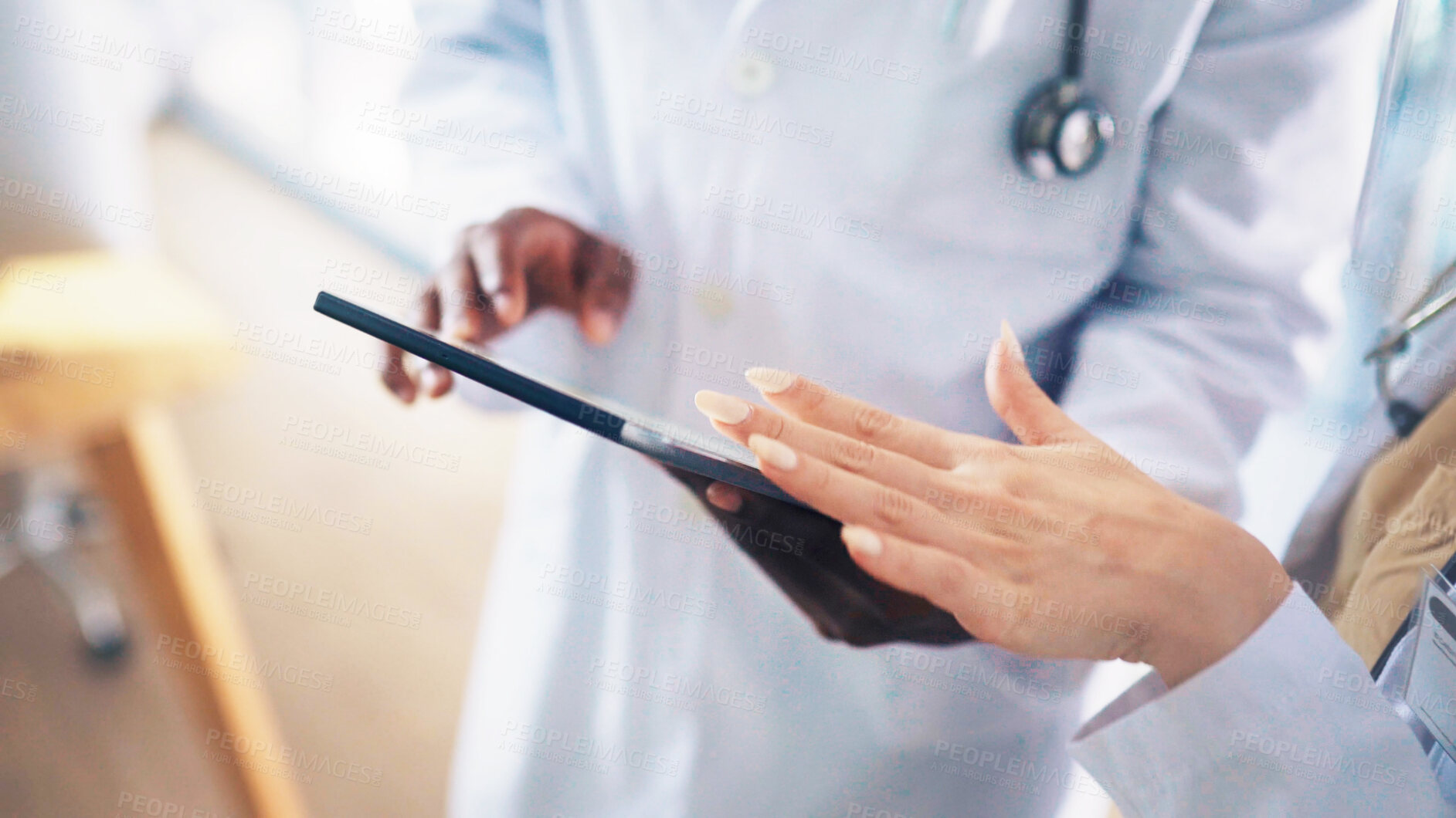 Buy stock photo Hands, tablet and team discussion with doctor for medical results, schedule or report in clinic. Technology, people and collaboration in hospital for healthcare information, telehealth and planning