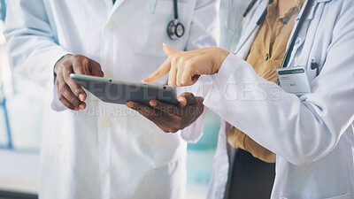 Buy stock photo Collaboration, hands and tablet with doctors in hospital together for medical consulting. App, pointing and healthcare with people in clinic for assistance, diagnosis review or results feedback