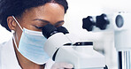 Microscope, research and face mask with black woman in lab for chemical study, medical and sample. Microbiology particles, discovery and vaccine experiment with scientist for cure and pharmacy
