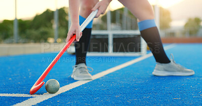 Buy stock photo Hockey stick, ball and legs on turf for training practice, physical activity or outdoor sports game. Fitness, coordination or person with control on field for passing,  match preparation or equipment