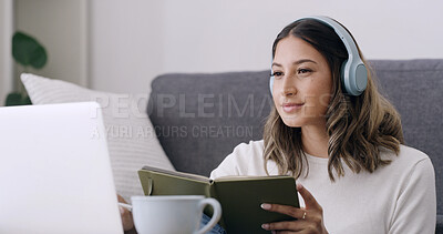 Buy stock photo Woman, book and laptop with headphones in home for elearning subscription, listen and education. Person, computer and student with notebook, attention and online course in living room at apartment