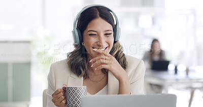 Buy stock photo Coffee, laptop and laughing with business woman in coworking office for music streaming. Computer, funny and headphones with happy employee drinking beverage in workplace for audio subscription