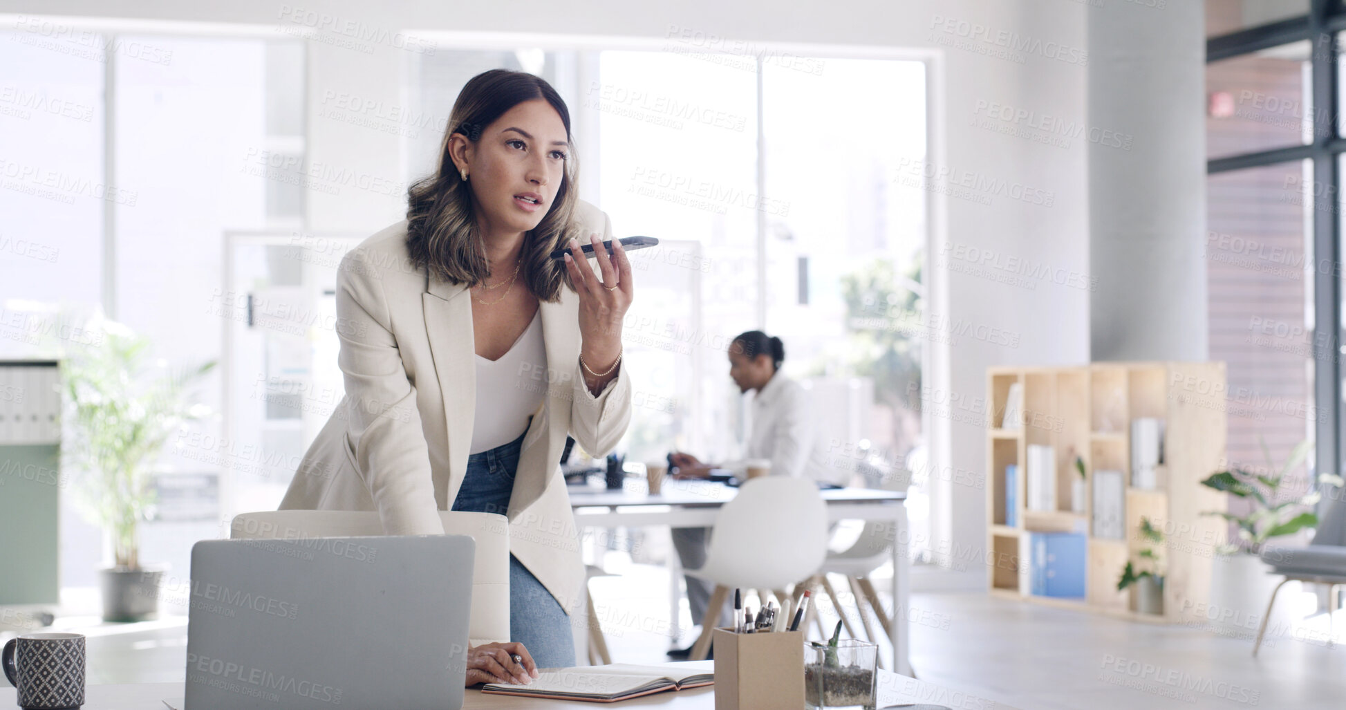 Buy stock photo Creative, woman and phone for audio message with editor feedback, schedule update and contact source. Person, laptop and voice recording for article advice, project reminder and chat for publication