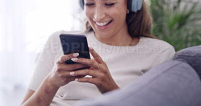 Buy stock photo Phone, hands and happy woman with headphones in home, streaming service or music on internet. Mobile, audio and person relax in living room for playlist search, online sound and listening to podcast