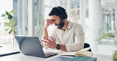 Buy stock photo Man, headache and stress with headset at office, laptop or frustrated with burnout at finance agency. Person, broker and advisor with pc, migraine and exhausted with voip tech at investment company