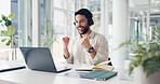 Man, celebration and laptop with headset at office, excited or deal with notification at finance agency. Person, broker and happy with computer, contact or fist pump for investment profit at company