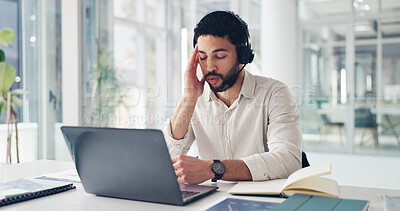 Buy stock photo Man, headache and laptop with headset at office, stress or frustrated with burnout at finance agency. Person, broker and advisor with pc, migraine and exhausted with voip tech at investment company