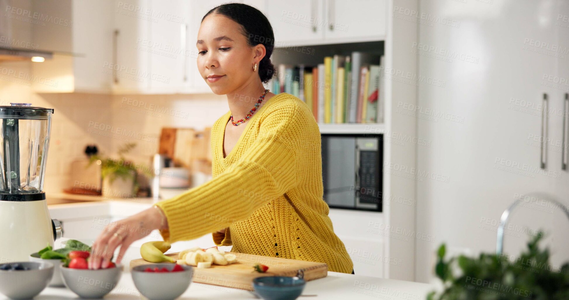 Buy stock photo Woman, nutrition or bowl with fruit in kitchen for organic meal prep, smoothie or blender in home. Female person, nutritionist and natural ingredients for healthy recipe, diet or wellness in house