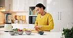 Woman, nutrition or strawberry with fruit in kitchen for organic meal prep, smoothie or blender. Female person, nutritionist and natural ingredients for healthy recipe, diet or wellness in home
