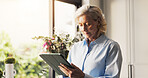 Home, tablet and senior woman with internet, retirement and connection with social media. Apartment, pensioner and mature person with tech, message and network with online reading and communication