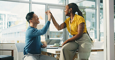 Buy stock photo Creative, business people and high five in office for goal achievement, success and target. Happy team, startup and celebration with employees for milestone, support or reward with laptop in company