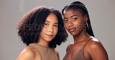 Buy stock photo Portrait, cosmetics and women in studio, beauty and aesthetic with glow on gray background. Dermatology, wellness or people with shine, shampoo and natural hair with volume, texture or healthy scalp