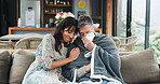 Couple, comfort and people in home, sick or support for partner with flu symptoms, love and marriage. Woman, help and mature man with allergies in living room, illness and healing with care in house