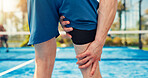 Hands, person and leg pain on tennis court from fitness, match accident and muscle sprain. Player, discomfort and joint strain with exercise mistake, inflammation and sports injury of tournament game