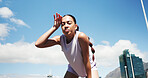Tired, woman or break with sweat in city for intense workout, training or outdoor exercise. Exhausted, female person or rest with recovery for stamina, endurance or physical activity in an urban town