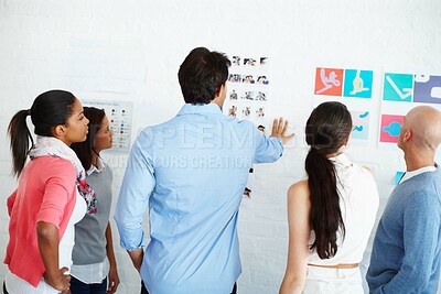Buy stock photo Shot of a group of casually dressed businesspeople in the office