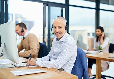 Buy stock photo Mature man, portrait and call centre advisor in coworking office, crm and consultant for support. Male person, headset and telemarketer for sale service, writing notes and information for assistance